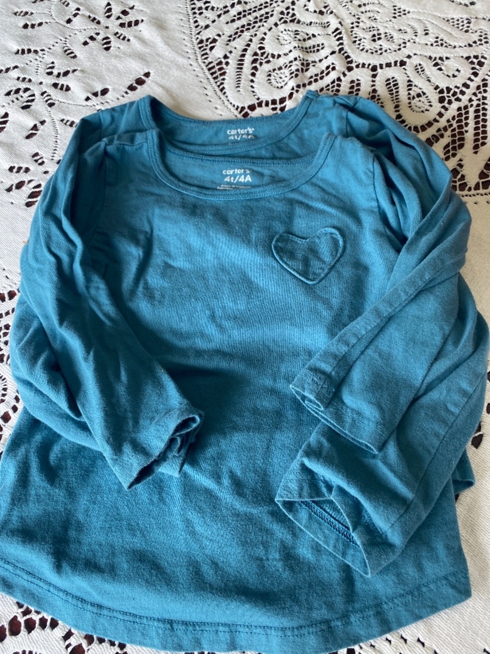 Blue Carter’s 4T, long sleeve shirt.
